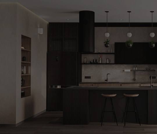 Diseño a la medida de cocina integral en tonos oscuros