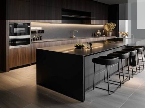 Cocina con isla negra y frentes de madera nogal